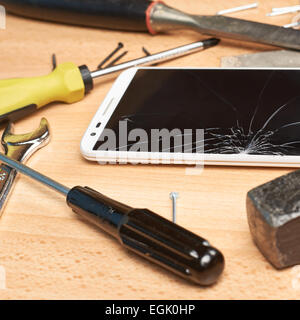 Repair mobile phone composition Stock Photo