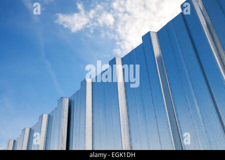 Blue corrugated metal fence background on the floor Stock Photo - Alamy