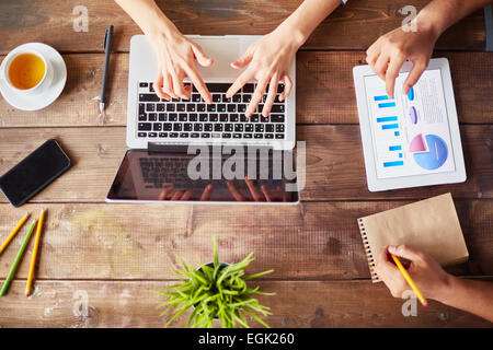 Businesspeople using modern technologies Stock Photo