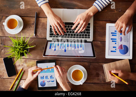 Group of business people using modern gadgets Stock Photo