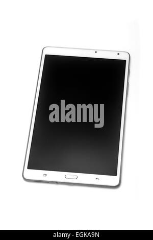 A touch tablet photographed in the studio on a white background. Tablette tactile photographiée en studio sur fond blanc. Stock Photo