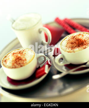 Two Cups Of Coffee Cappuccino And Latte Heart Shaped Art On Wooden 