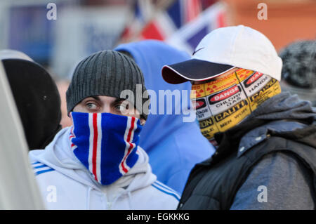 12th January 2013, Belfast, Northern Ireland.  Two rioters with their faces masked.   It follows clashes between Loyalists and Nationalists groups after a protest at Belfast City Hall.  Bricks, heavy masonry, fireworks and bottles were thrown at the police Stock Photo