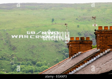 Belfast, Northern Ireland. 17th June 2013. On the opening day of the G8 summit in Fermanagh, republicans place a giant sign on the side of Black Mountain which reads 'G8/NWO War Criminals' Stock Photo