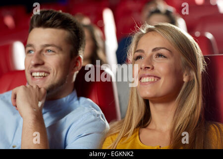 happy friends watching movie in theater Stock Photo