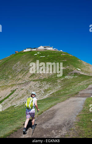 Europe, Switzerland, Swiss Alps Jungfrau-Aletsch Unesco World Heritage site, hiker below a mountain refuge Stock Photo