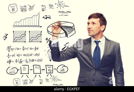 buisnessman drawing plan on virtual screen Stock Photo