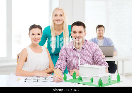 smiling architects working in office Stock Photo
