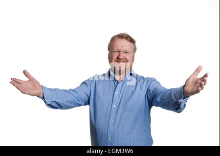 Friendly middle aged bearded guy in blue shirt - on white Stock Photo