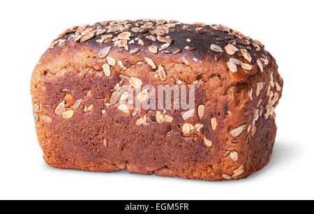 Unleavened black bread with nuts seeds and dried fruit rotated isolated on white background Stock Photo