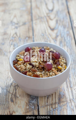 Cereals in a Bowl on a rustic wooden table Stock Photo