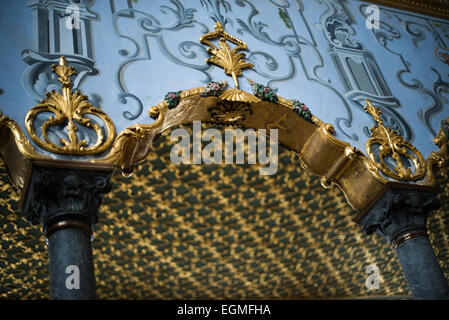 ISTANBUL, Turkey / Türkiye — The ornately decorated Imperial Throne Room in the Harem of Topkapi Palace. The Imperial Harem was the inner sanctum of the Topkapi Palace where the Sultan and his family lived. Standing on a peninsular overlooking the Bosphorus Strait and Golden Horn, Topkapi Palace was the primary residence of the Ottoman sultans for approximately 400 years (1465–1856) of their 624-year reign. Stock Photo