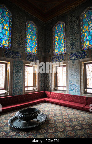 ISTANBUL, Turkey (Türkiye) — The Twin Kiosk at Topkapi Palace consists of two privy chambers built in the 17th century, at different times. It is decorated with Iznik tiles and draws on a number of classical Ottoman styles used throughout the palace. From the 18th century, the Twin Kiosk was used as the privy chamber of the Crown Prince. The Imperial Harem was the inner sanctum of the Topkapi Palace where the Sultan and his family lived. Standing on a peninsular overlooking the Bosphorus Strait and Golden Horn, Topkapi Palace was the primary residence of the Ottoman sultans for approximately 4 Stock Photo