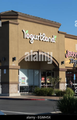 Yogurtland self serve storefront international franchise chain of frozen yogurt in Santa Ana southern California USA Stock Photo