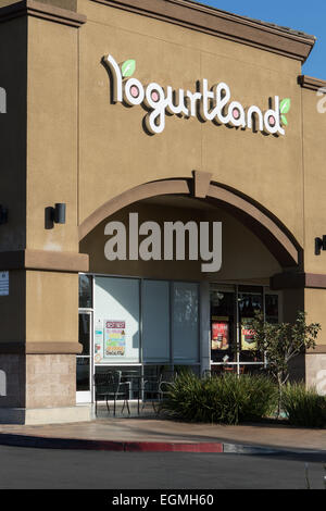 Yogurtland self serve storefront international franchise chain of frozen yogurt in Santa Ana southern California USA Stock Photo