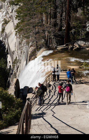 Visitors to Yosemite National Park in California USA at the top of Vernal falls in Stock Photo