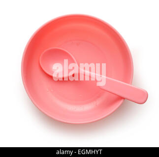 Pink plastic tableware dish, spoon and fork Stock Photo