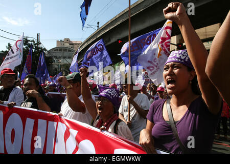 Manila, Philippines. 27th February, 2015. Women Rights group Gabriela joined the call for President Aquino's resignation during their march to Mendiola Bridge in Manila. Composed mostly of students, they walked out of their class to air their resentment over Aquino's alleged inefficiency in governing and solving the country's problems. Militant groups also joined the march to the call for Aquino's resignation. Credit:  J Gerard Seguia/Pacific Press/Alamy Live News Stock Photo