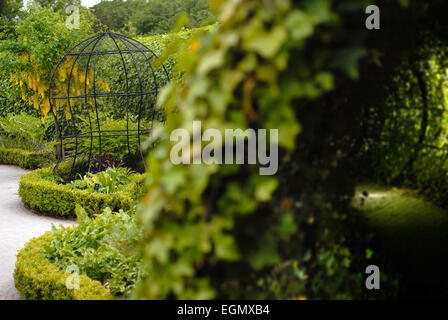 Ivy tunnel in the poison garden at the Alnwick Garden Stock Photo