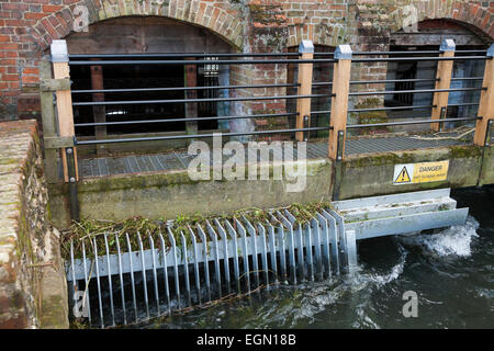 Moving water flowing around, into, through the Winchester mill; being used to drive operate the water wheel. Winchester Mill, UK Stock Photo