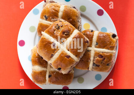 Marks & Spencer Berries & Cherries Hot Cross Buns with raspberries cranberries blackberries and cherries on plate ready for Easter Stock Photo