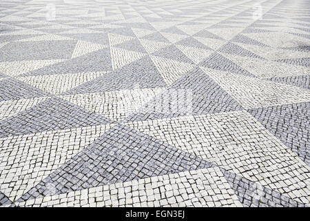 Typical stone floor Lisbon, detail of a typical floor with shapes and drawings, art Portugal, tourism Stock Photo