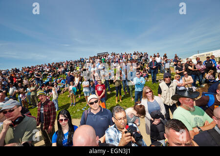 Crowd watching drag racing at the Santa Pod Raceway in Podington Stock Photo