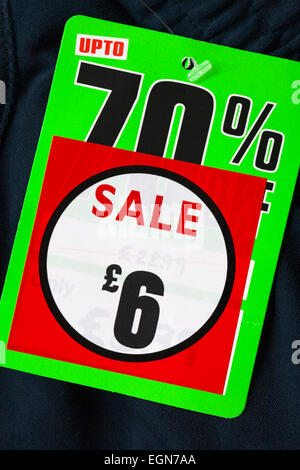 Up to 70% off sticker on track suit bottoms for £6 in sale at Sportsdirect - reduced label tag Stock Photo