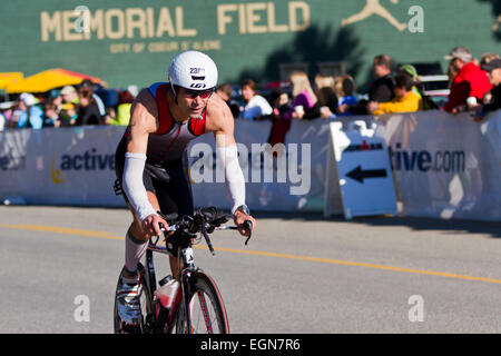 COEUR D ALENE, ID -  JUNE 23: Joseph Schimitzer, Triathlete on the bike part of the ironman triathlon, June 23 2013 in Coeur d'  Stock Photo