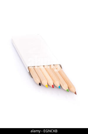 Various color pencils in box on white background Stock Photo