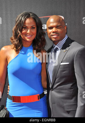 LOS ANGELES, CA - JULY 16, 2014: Boxer Laila Ali, daughter of Muhammed Ali, & husband Curtis Conway at the 2014 ESPY Awards at the Nokia Theatre LA Live. Stock Photo