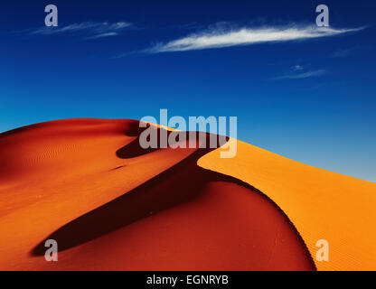 Sand dune in Sahara Desert at sunset, Tadrart, Algeria Stock Photo