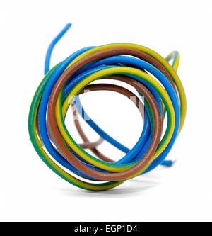 Domestic electrical wire coiled up Stock Photo