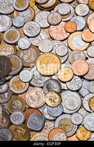A collection of coins from around the world - International currency. Stock Photo