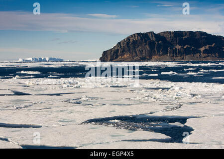Antarctica, Weddell Sea, floating pack ice off rocky headland Stock Photo