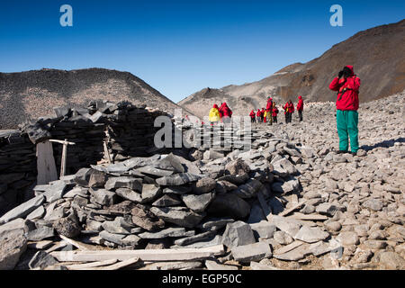 Antarctica, Paulet Island, cruise ship passengers viewing 1903 Larsen Stone Hut Stock Photo