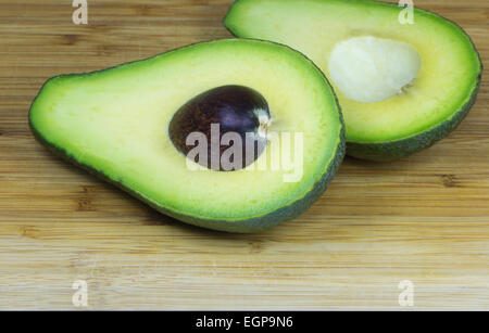 Avocado on wood Stock Photo