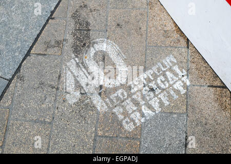 Oxford Circus, London, UK. 28th February 2015. February 24. Graffiti sprayed on the pavements around Oxford Circus to mark the release of the remastered version of the Led Zeppelin album Physical Graffiti released in 1975. Credit:  Matthew Chattle/Alamy Live News Stock Photo