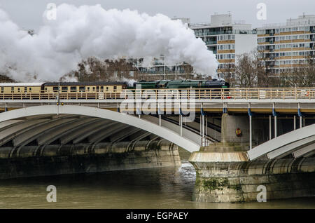 British Rail Merchant Navy Class 4-6-2 no 35028 'Clan Line' crossing the River Thames after departing London Victoria station, UK Stock Photo