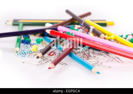 colored pencils, paper clips heap Stock Photo