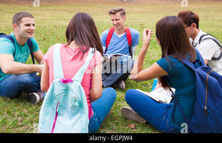 College students studying and discuss together in campus Stock Photo