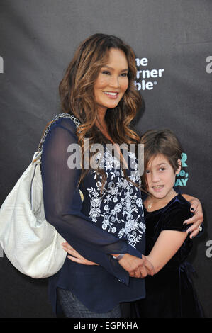 LOS ANGELES, CA - OCTOBER 6, 2014: Tia Carrere & daughter Bianca Wakelin at the world premiere of 'Alexander and the Terrible, Horrible, No Good, Very Bad Day' at the El Capitan Theatre, Hollywood. Stock Photo