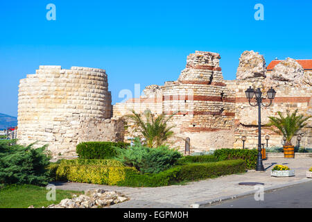 Ruined tower and stone walls around the old Nessebar town, Bulgaria Stock Photo