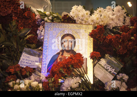 Moscow, Russia. 28th Feb, 2015. The place where Boris Nemtsov, a Russian opposition leader and the Russian president's critic, was killed near St. Basil Cathedral, Red Square, in Moscow, Russia. The papers with text ''Without you doesn't come Spring'' (on the right from the icon) and ''Boris you always were the president for me'' (on the left from the icon) can be seen.Nemtsov was killed a day before the antigovernment protest in Moscow. Credit:  Anna Sergeeva/ZUMA Wire/Alamy Live News Stock Photo