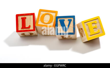 Love in Colored Wooden Letter Blocks Stock Photo