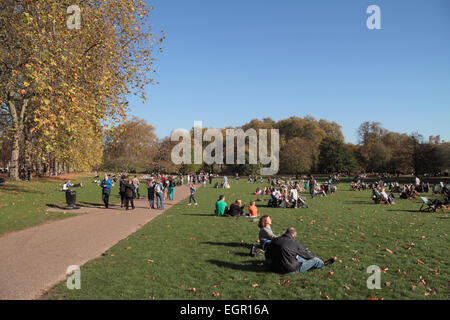 People relaxing on an autumn afternoon in St James's Park, London, UK. Stock Photo
