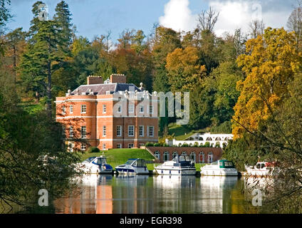 Bucks - Paladian Harleyford manor built 1775 seen across Thames autumn sunlight colours moored boats reflections
