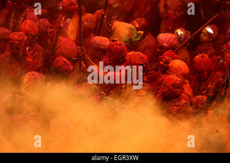 Thousands of Hindu devotees took part and celebrate 'Lathmar Holi'. The colours fill the atmosphere as people throw abeer and gulal in the air showing great joy and mirth in the arrival of this Spring Festival. The rituals of the ancient festival of Holi are religiously followed every year with care and enthusiasm. © Shashi Sharma/Pacific Press/Alamy Live News Stock Photo