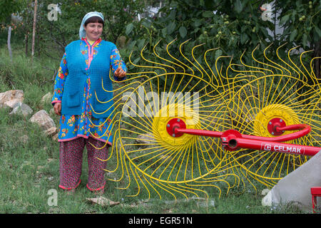 Yoruk Lady With Farming Machinery Stock Photo