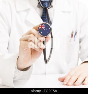 Doctor holding stethoscope with flag series - Australia Stock Photo